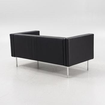 A leather upholstered sofa, 21st Century.