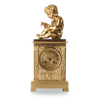 154. A French Empire early 19th century mantel clock.