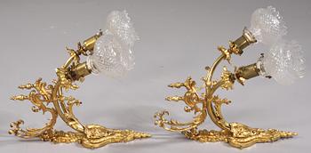 VÄGGLAMPETTER, ett par, Louis XV-stil, 1900-tal.