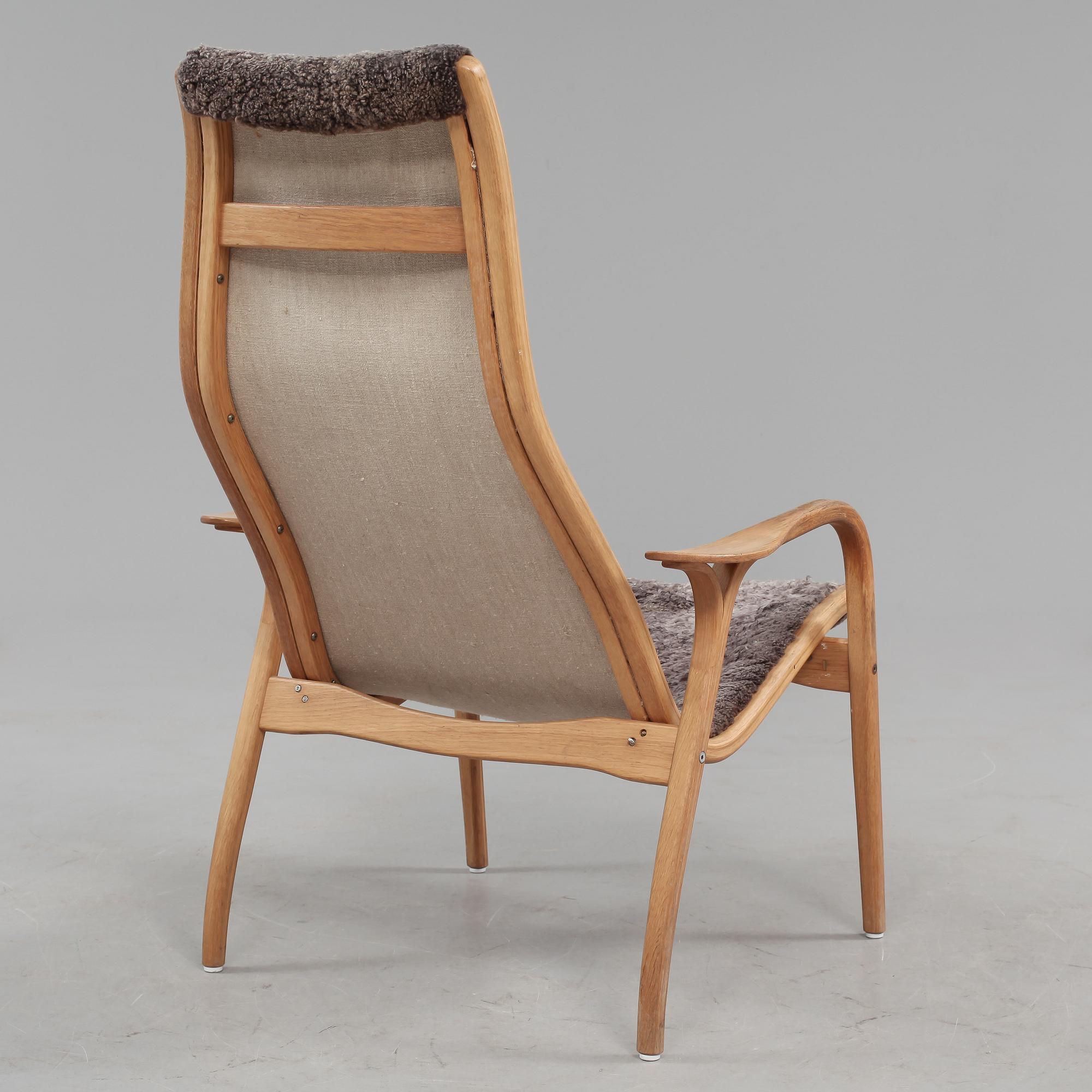 FÅTÖLJ samt FOTPALL, "Lamino", Yngve Ekström, Swedese, 1900-talets fjärde kvartal.