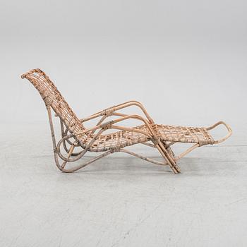 Rattan sun bed/recliner/deck chair, mid 20th Century.
