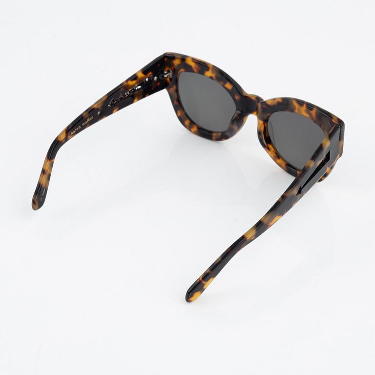 Karen Walker, a pair of tortoise "Northern lights" sunglasses.