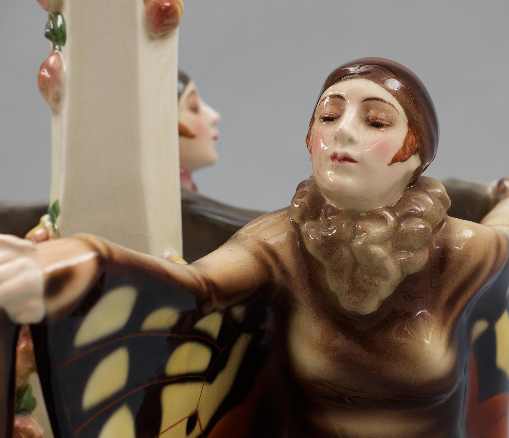 A Josef Lorenzl "The captured bird" triple figural lamp, Goldscheider, Wien circa 1925.