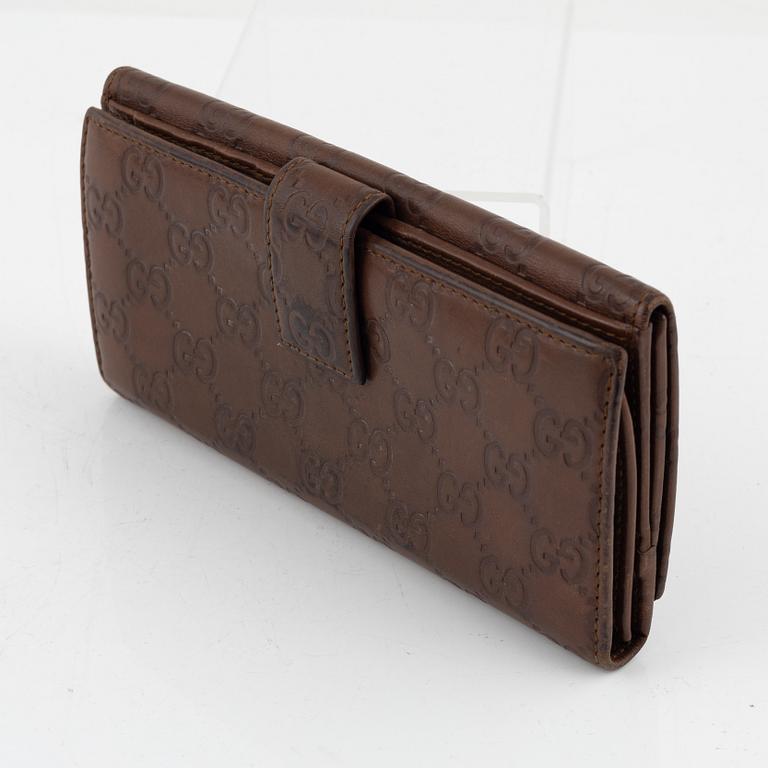 Gucci, leather wallet.