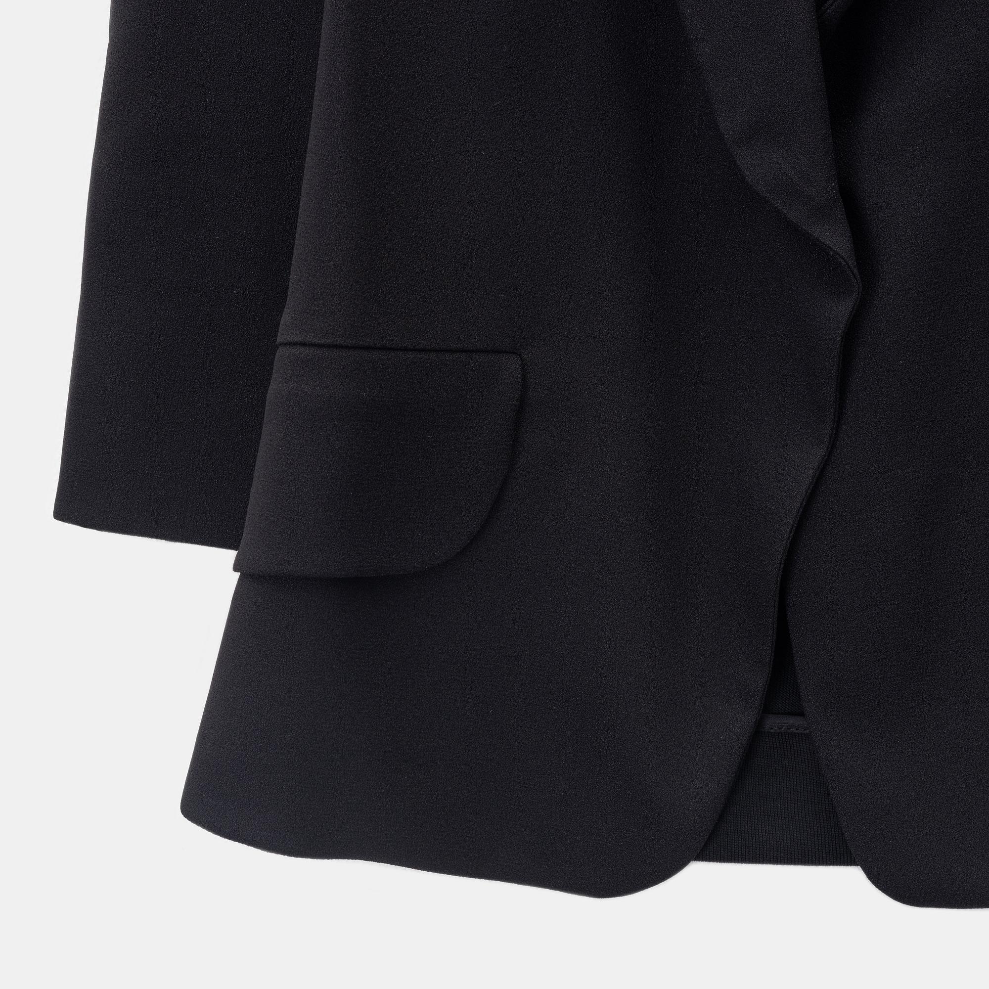 Yves Saint Laurent, a black jacket, Printemps / Eté 2009, size 34.