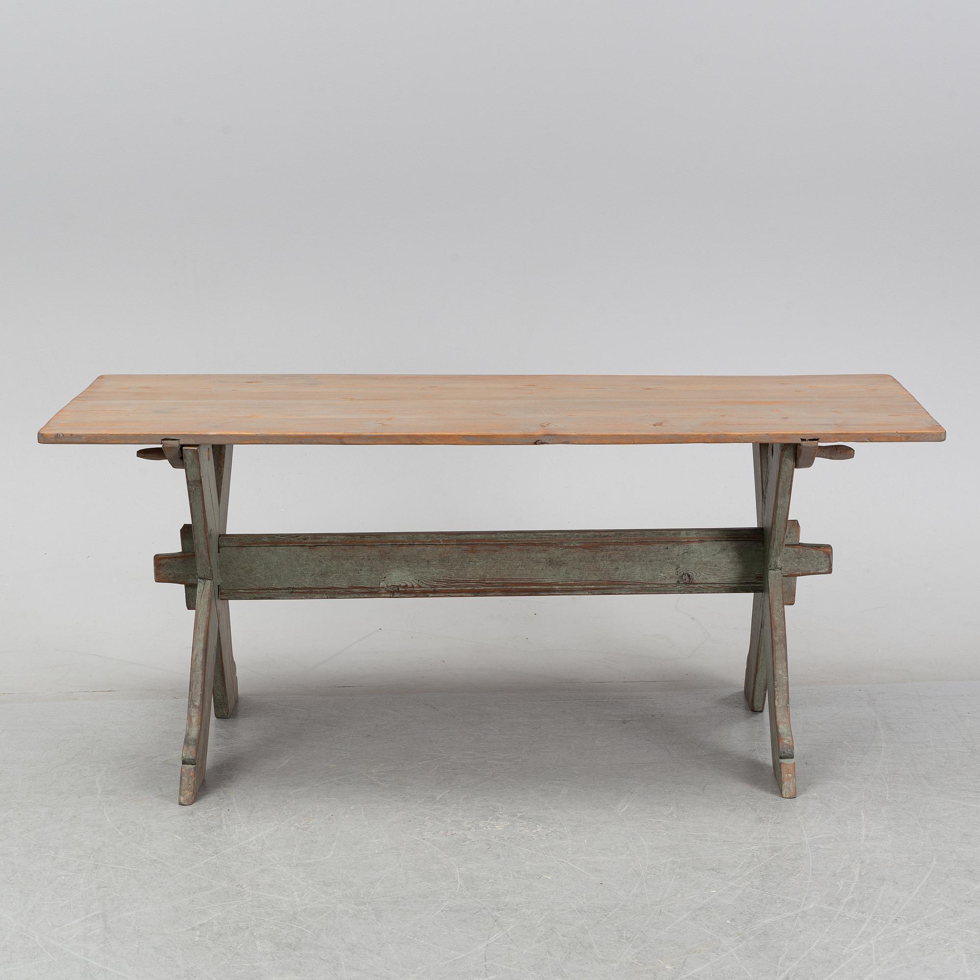 A 19th Century painted pine table.