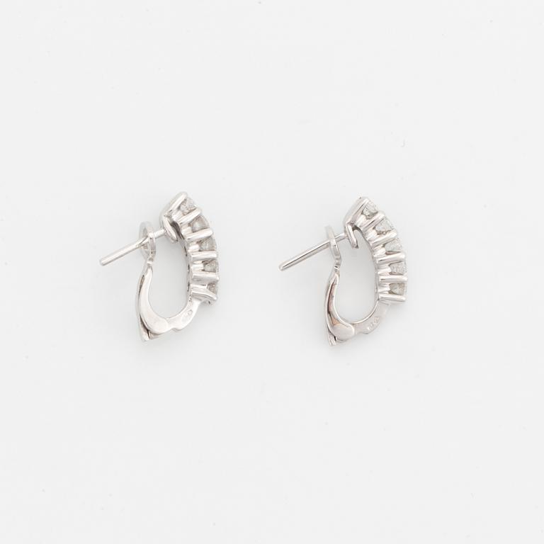 Brilliant-cut diamond earrings.