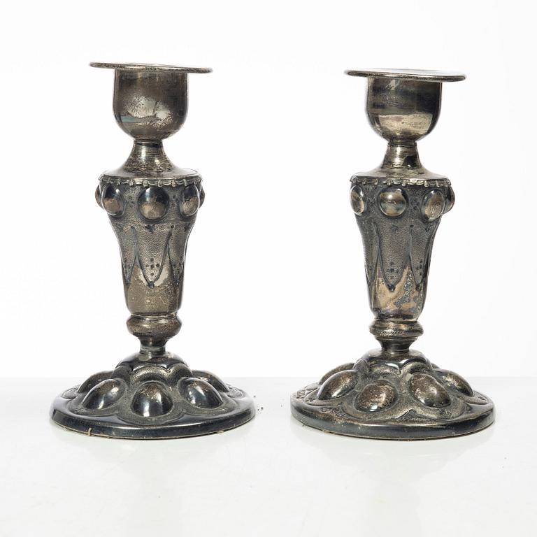 Four pairs och Swedish silver candlesticks, 19th-20th century.