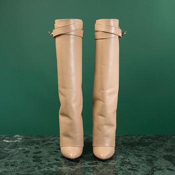 A pir of BOOTS by GIVENCHY in size 37.