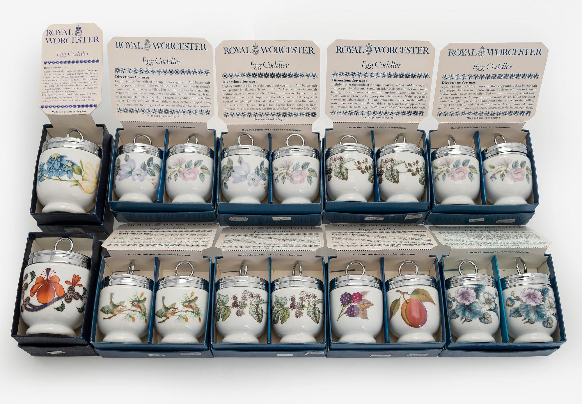 A set of eighteen egg coddlers, Royal Worcester, England, late 20th century.