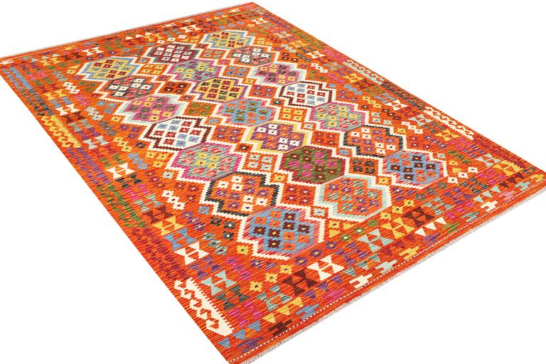 An Afghan kilim rug, c. 290 x 203 cm.