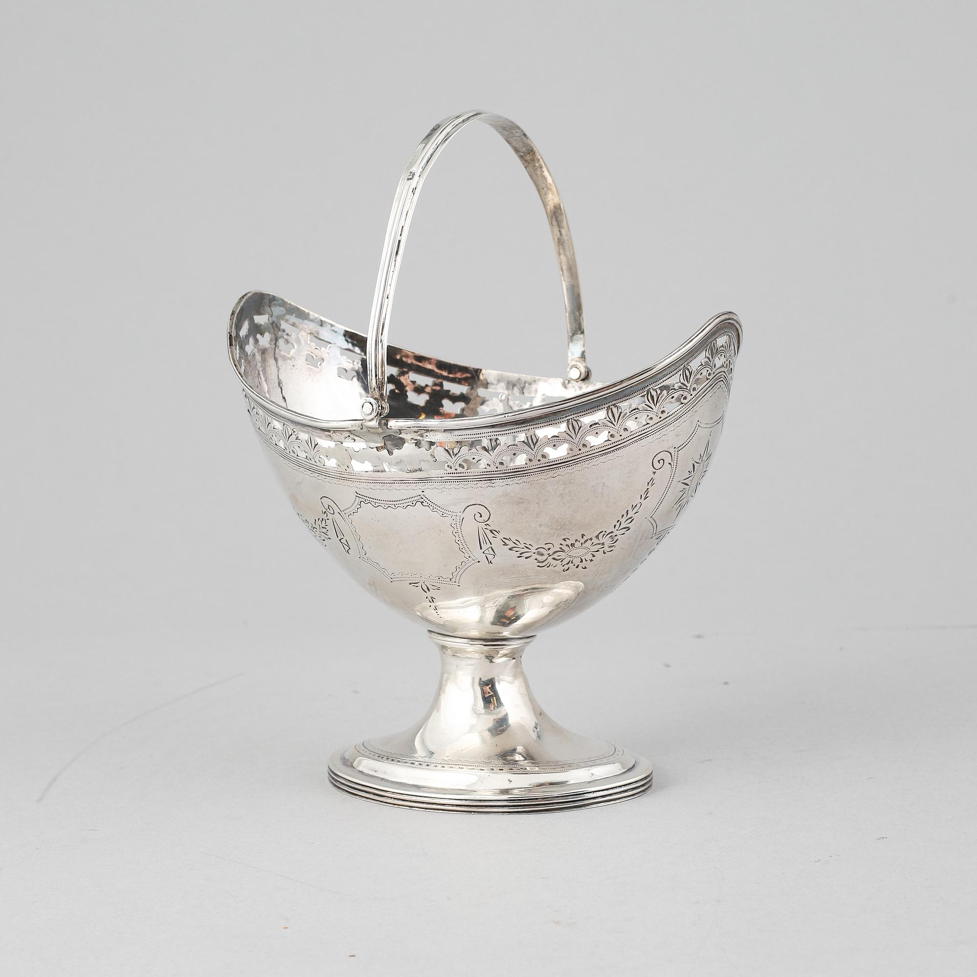 A silver basket, mark of William Stroud, London 1809.