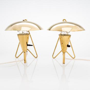 Two mid-20th-century wall lights / table lamps, model EV 57 for Itsu, Finland.