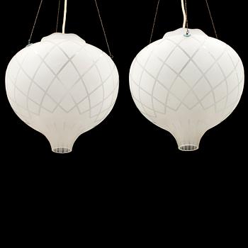 A pair of ceiling lights, probably 1940s.