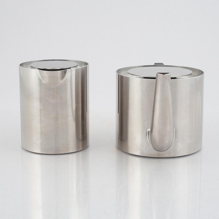 Arne Jacobsen, a 100-year jubilee "Cylinda" stainless steel tea set and a book, Stelton, Denmark, 2002.