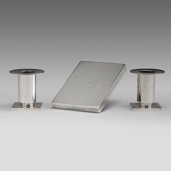 138. Wiwen Nilsson, a silver set with a pair of candlesticks and a cigarette case, Lund Sweden 1927-38.