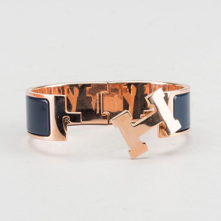 A Hermès "Clic-H" bracelet.