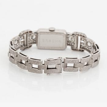 A bracelet/watch in platinum and 18K white gold set with old- and eight-cut diamonds.