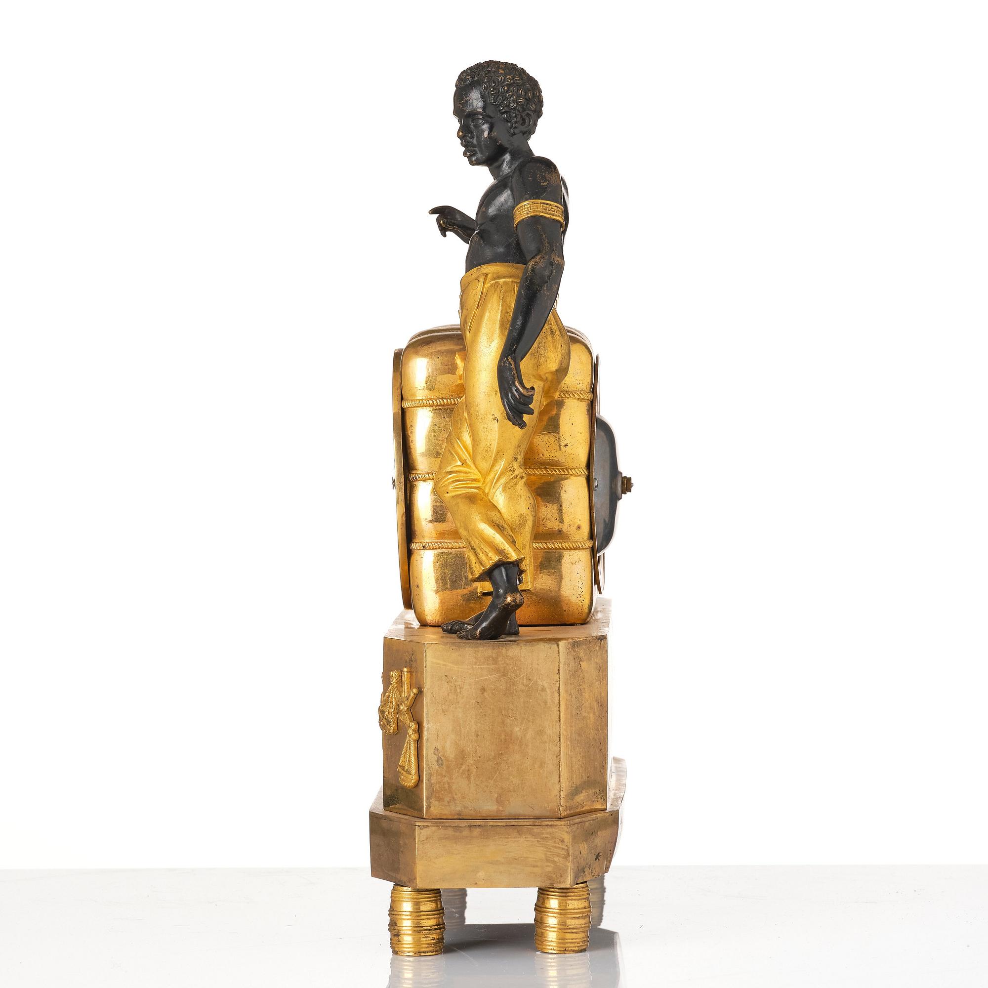An Empire ormolu and patinated bronze 'Le Matelot'  mantel clock by P. Strengberg (active 1802-1831).