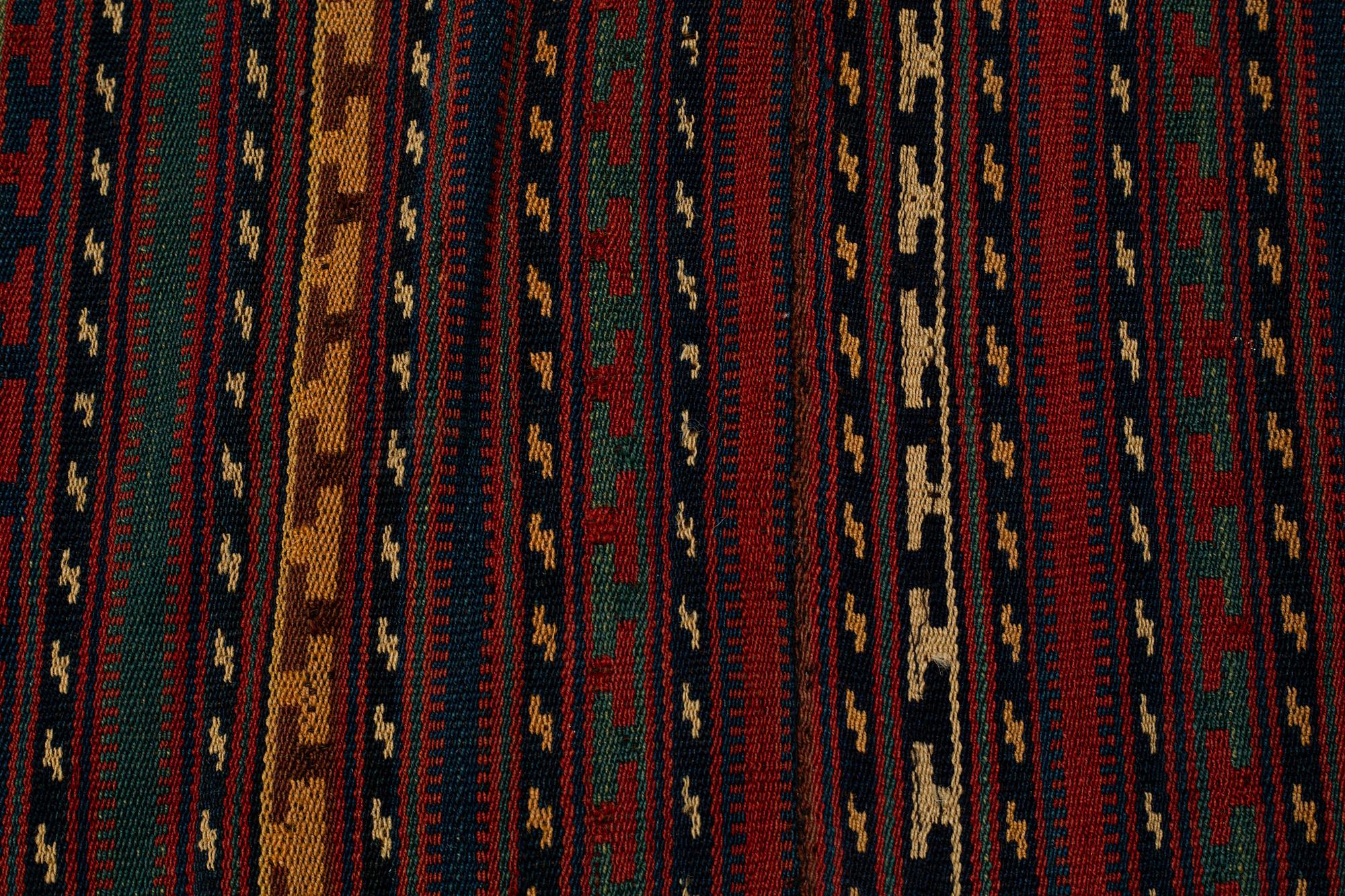 A CARPET, old oriental flat weave, ca 179 - 184 x 148 cm.
