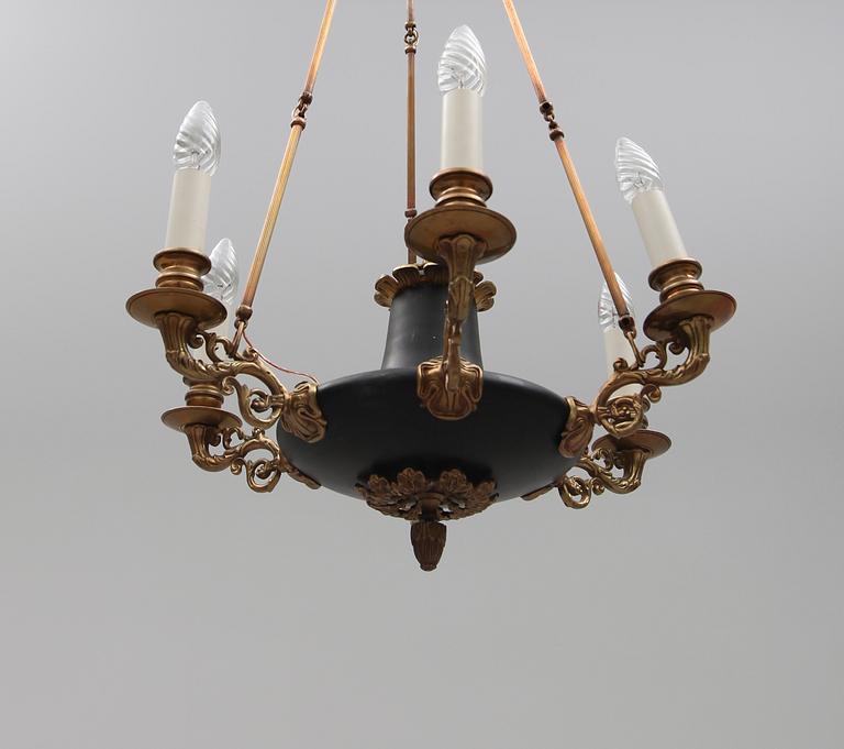 TAKAMPEL, empirestil, 1900-talets första hälft. Höjd ca 80 cm.
