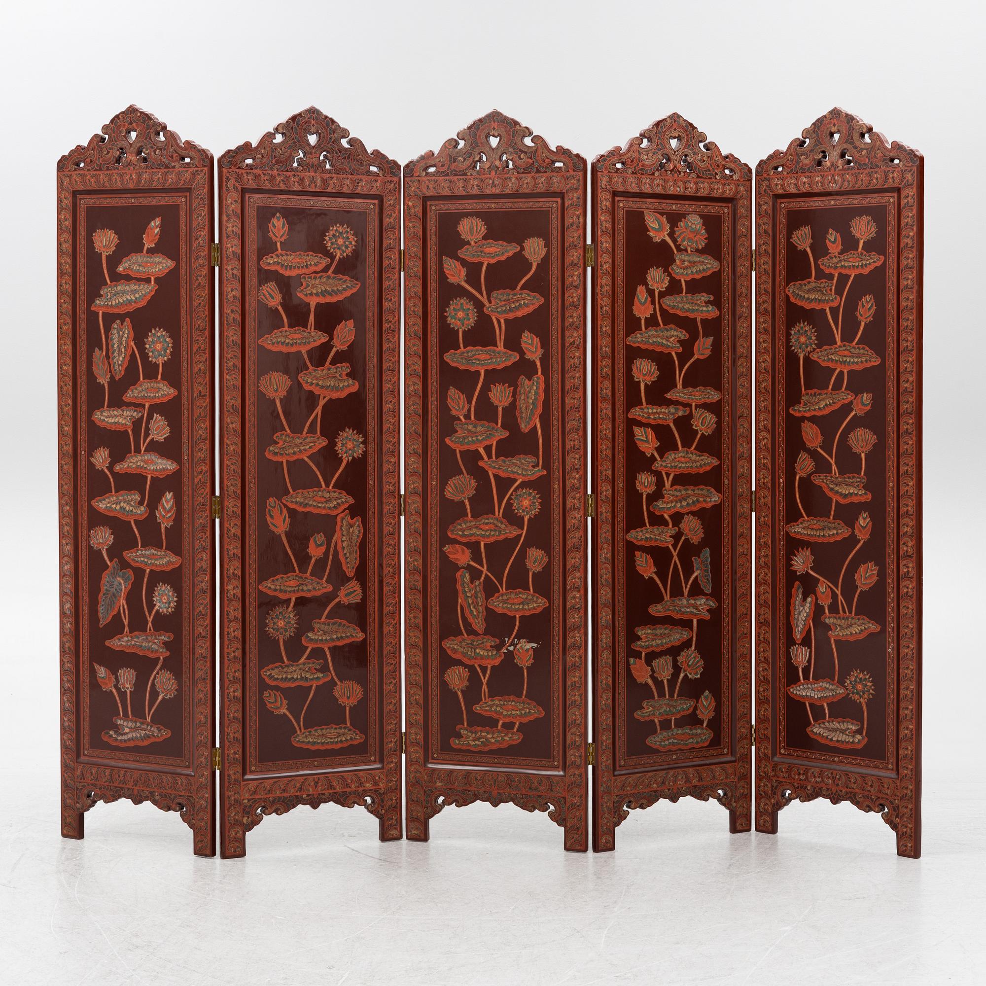 A folding screen, south east Asia, second half of the 20th century.