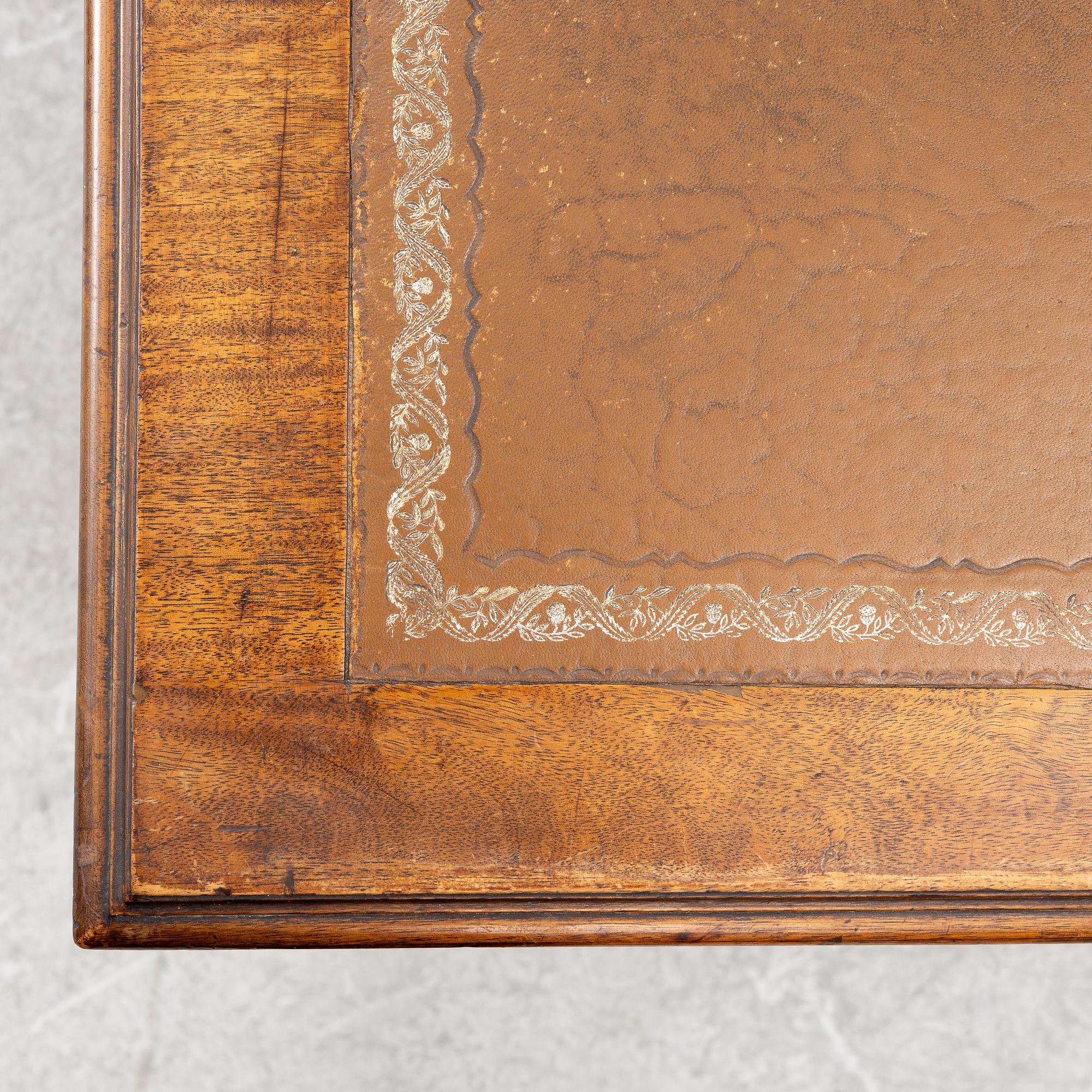 An English style desk, circa 1900.