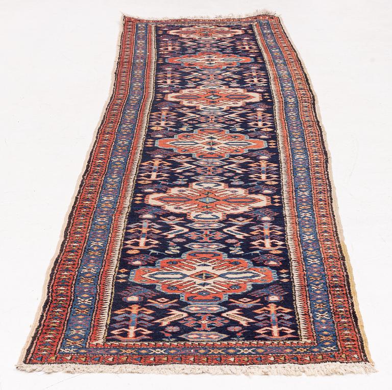 A runner carpet, Northwest Persian, circa 328 x 80 cm.