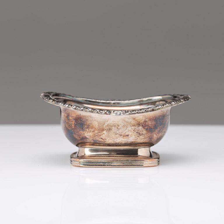 A pair of 20th century coasters, white metal and an English silver plated salt-cellar and A 20th c glass table-bell.