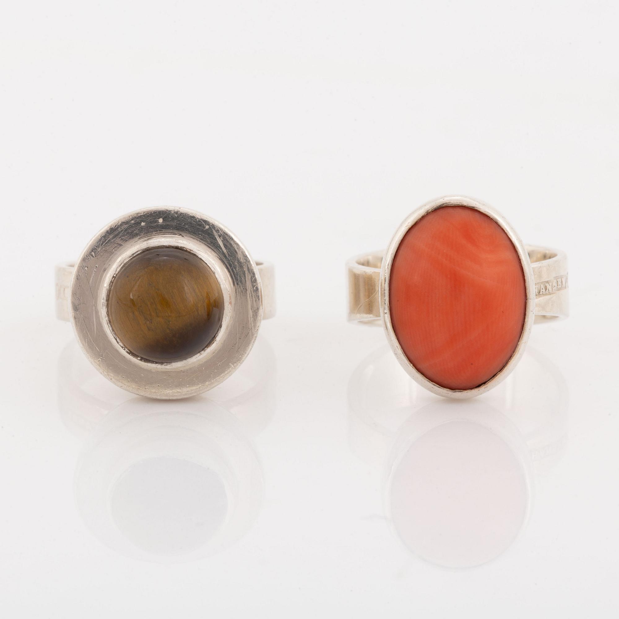 Hansen, two silver rings, coral and tiger's eye.