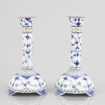 A pair of 'Blue Fluted Full Lace' porcelain Candle sticks, Royal Copenhagen, model number 1008, post 1923.