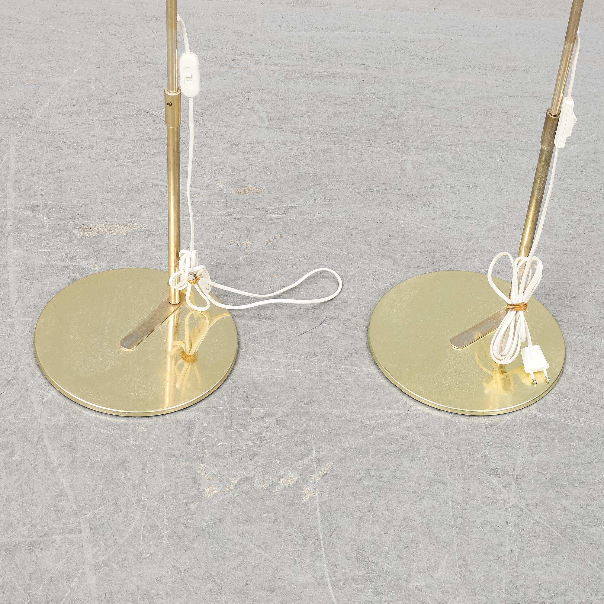 A pair of IKEA floor lamps.