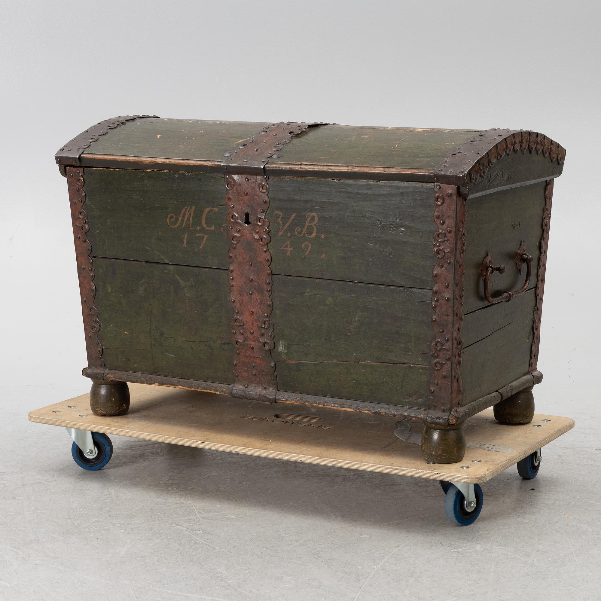 A folk art chest, dated 1749.