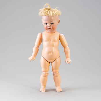 A bisque head character doll 115A by Kämmer & Reinhardt, Germany, ca 1911.