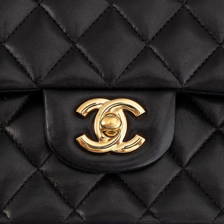 Chanel, a black, quilted leather 'Double Flap' bag, 2011.