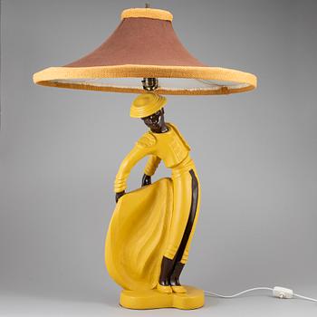 A ceramic table lamp, signed 1951.