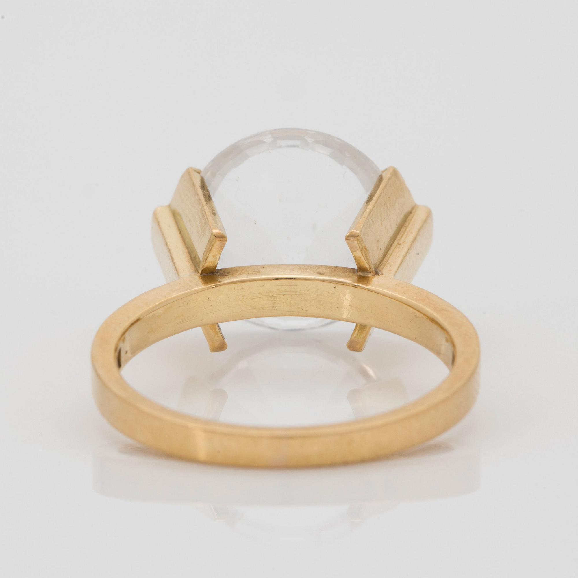 Wiwen Nilsson, an 18k gold ring with a facet cut rock crystal, Lund 1962.
