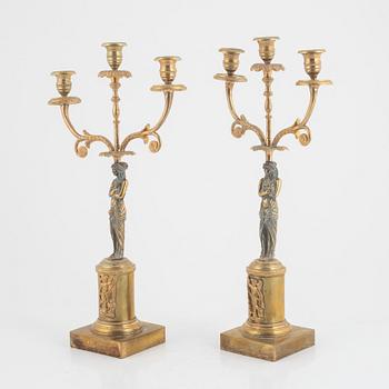 A pair of Empire style candelabra, around 1900.