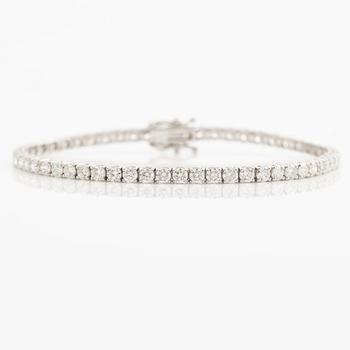 Tennis bracelet 18K white gold with brilliant-cut diamonds.