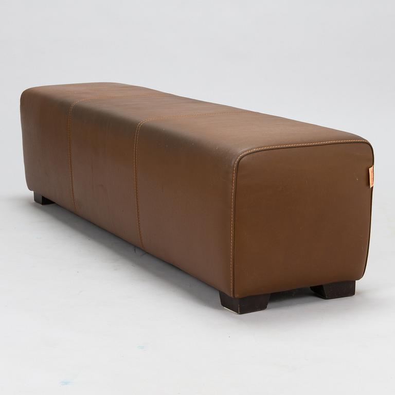 A leather-upholstered bench from Industria Divani e Poltrone, Italy.