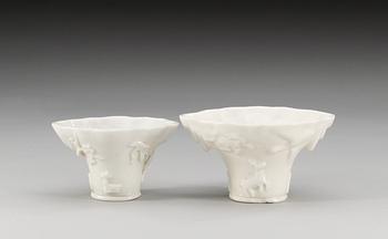 Two blanc de chine rhinoserous shaped libation cups, Qing dynasty, Kangxi (1662-1722).