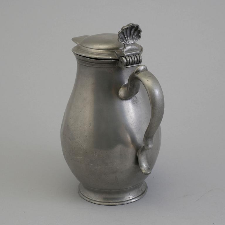 A 18th century tin pot.