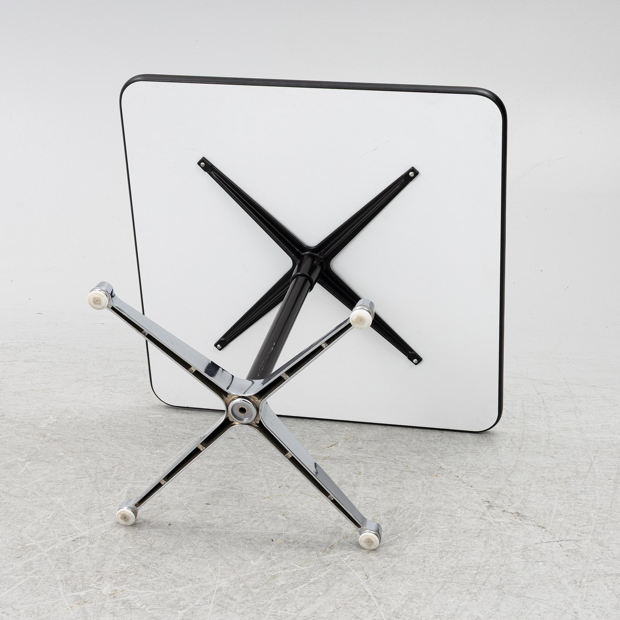 Charles & Ray Eames, A "Contract Base" table, Vitra, 2000s.