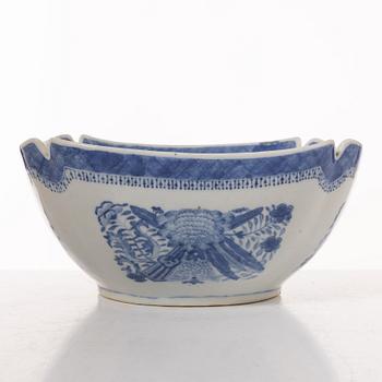 A group  of three serving dishes, a serving bowl, a cup, and seven plates, porcelain, including China 18th century.