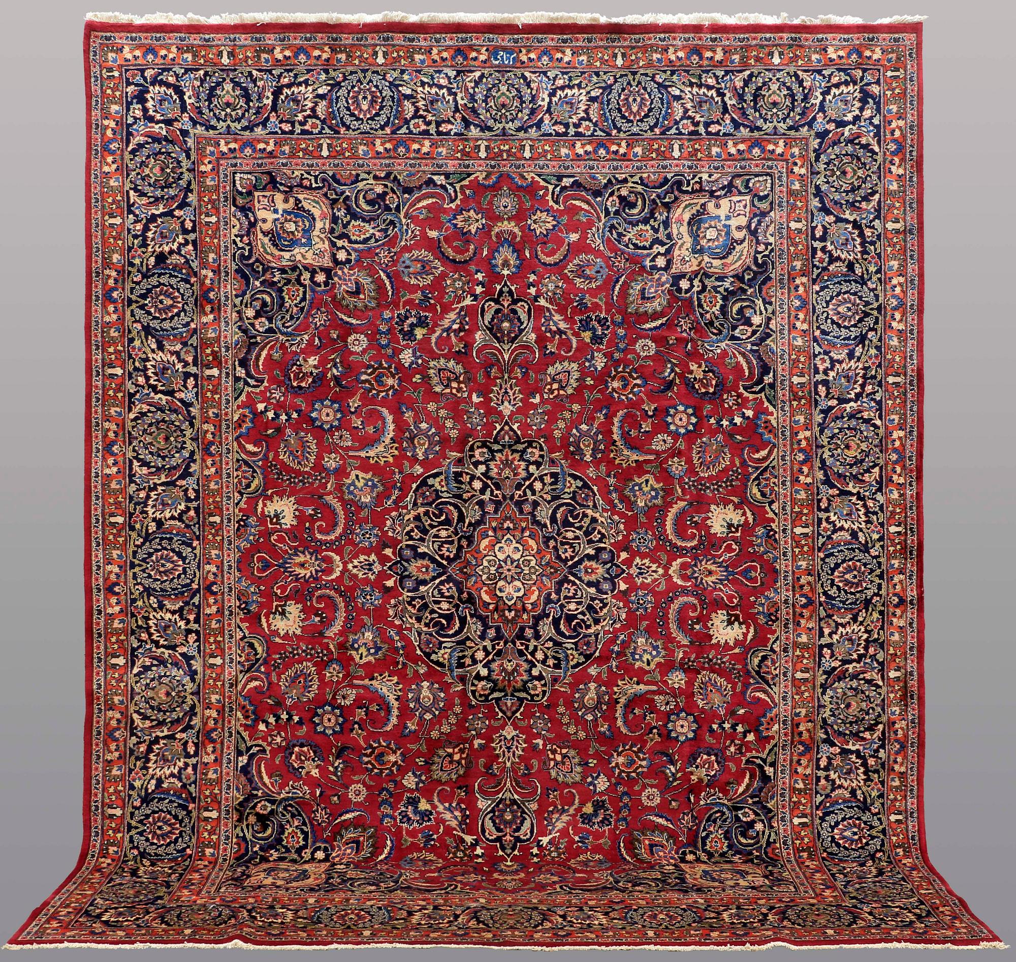 A CARPET, Mashad, signed, ca 385 x 293 cm.