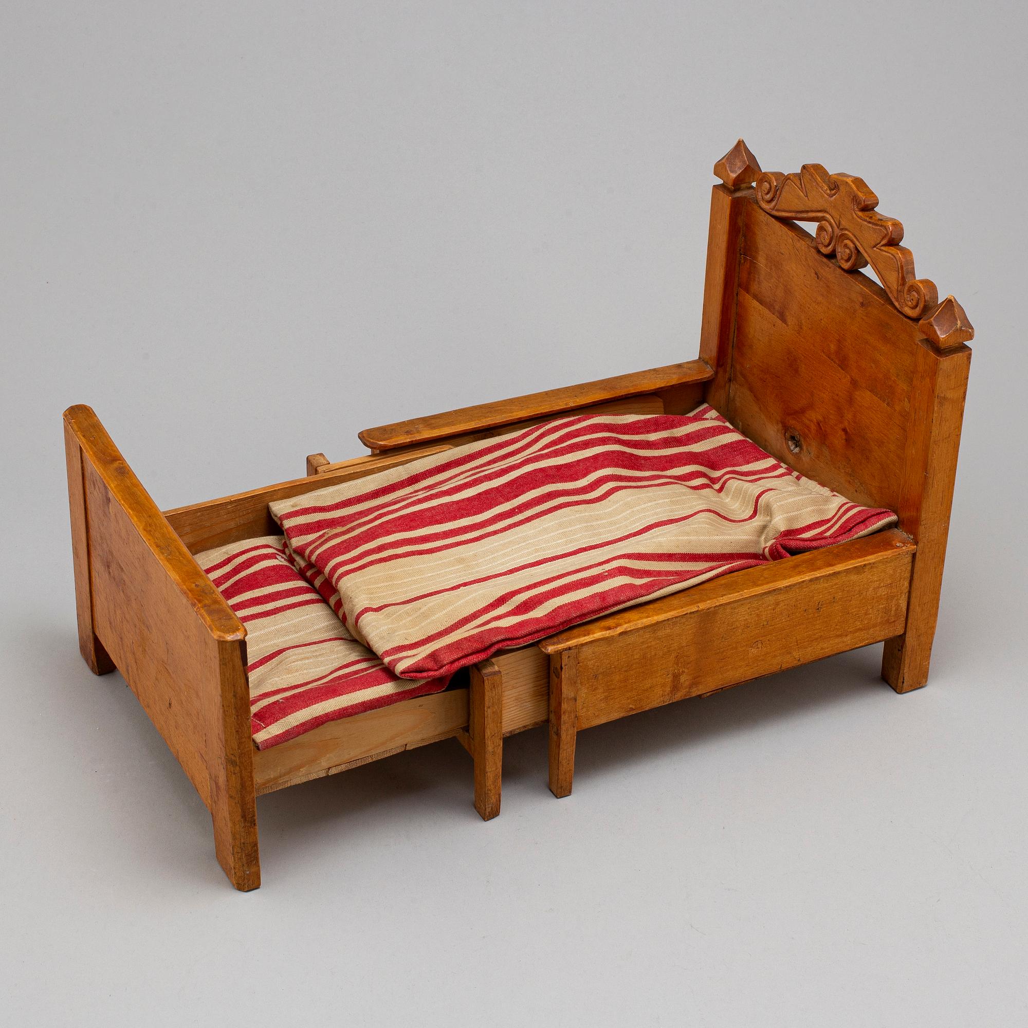 A china head doll and a 3 psc of doll furniture.