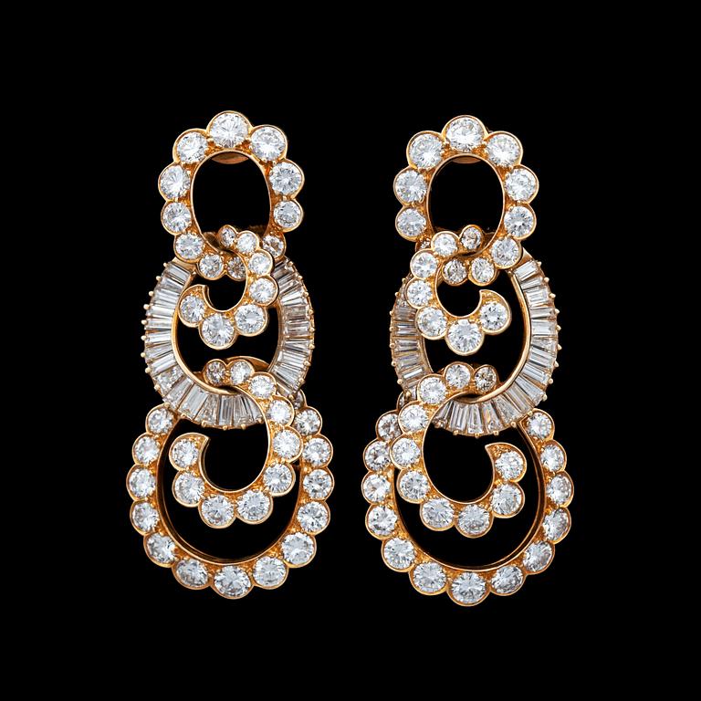 A pair of Van Cleef & Arpel earrings set with different cut diamonds, tot. 15 cts.
