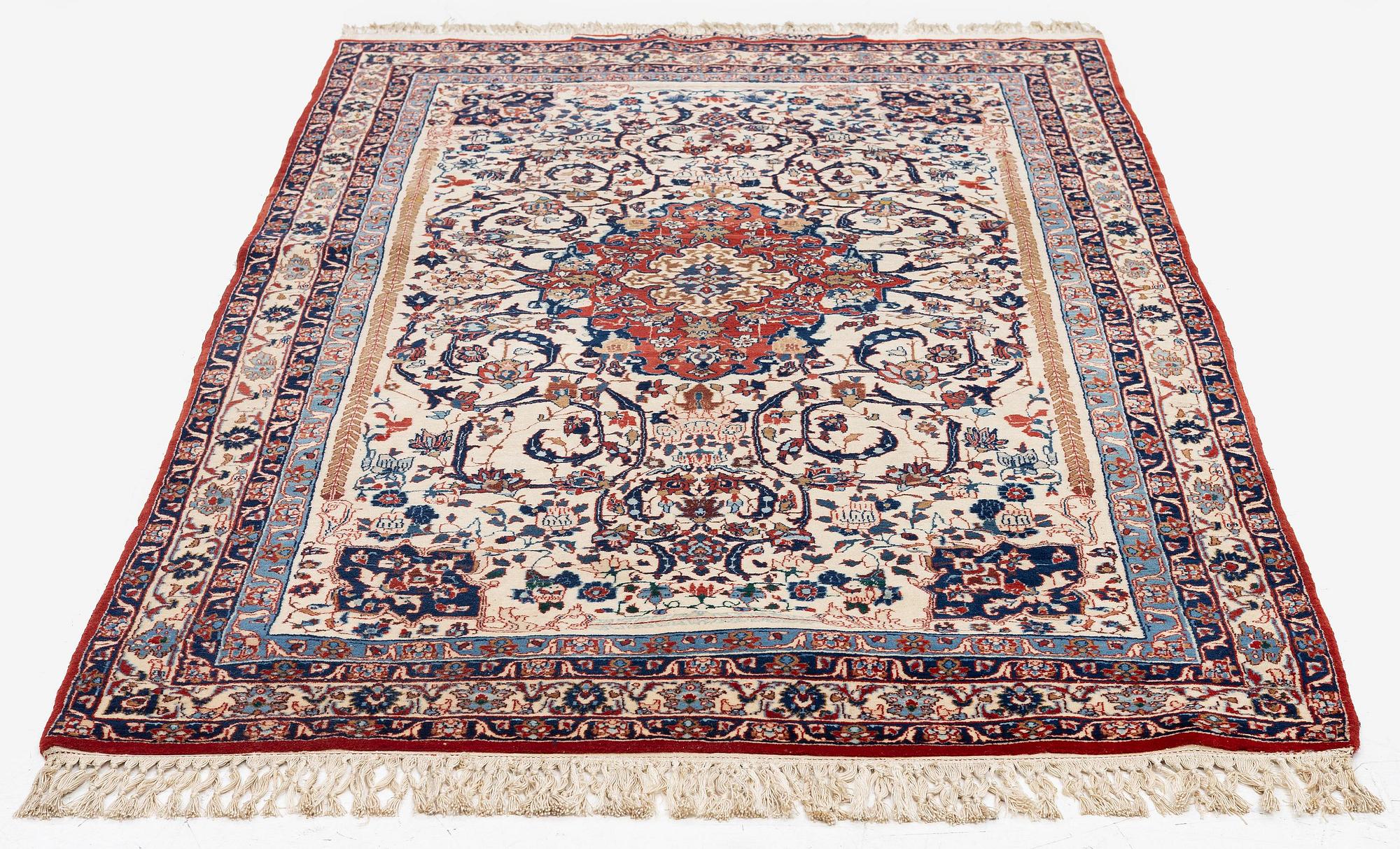 An Isfahan carpet, Central Persia, signed (Hossein) Seirafian, c. 178 x 102 cm.
