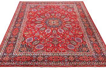 A Keshan carpet, c. 355 x 245 cm.