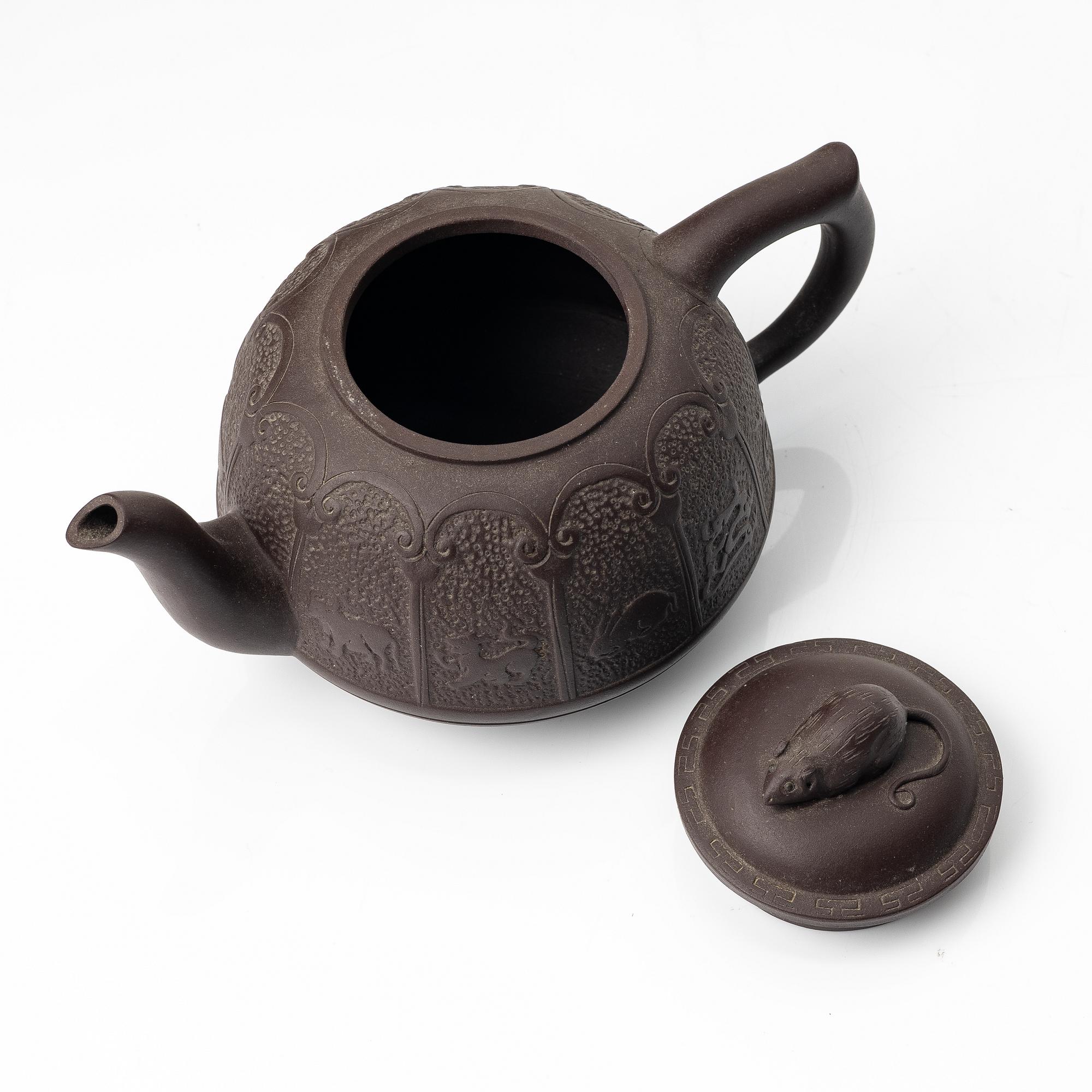 Bao Zhenglan, A brown yixing 'zodiac' teapot, China, 1990s.